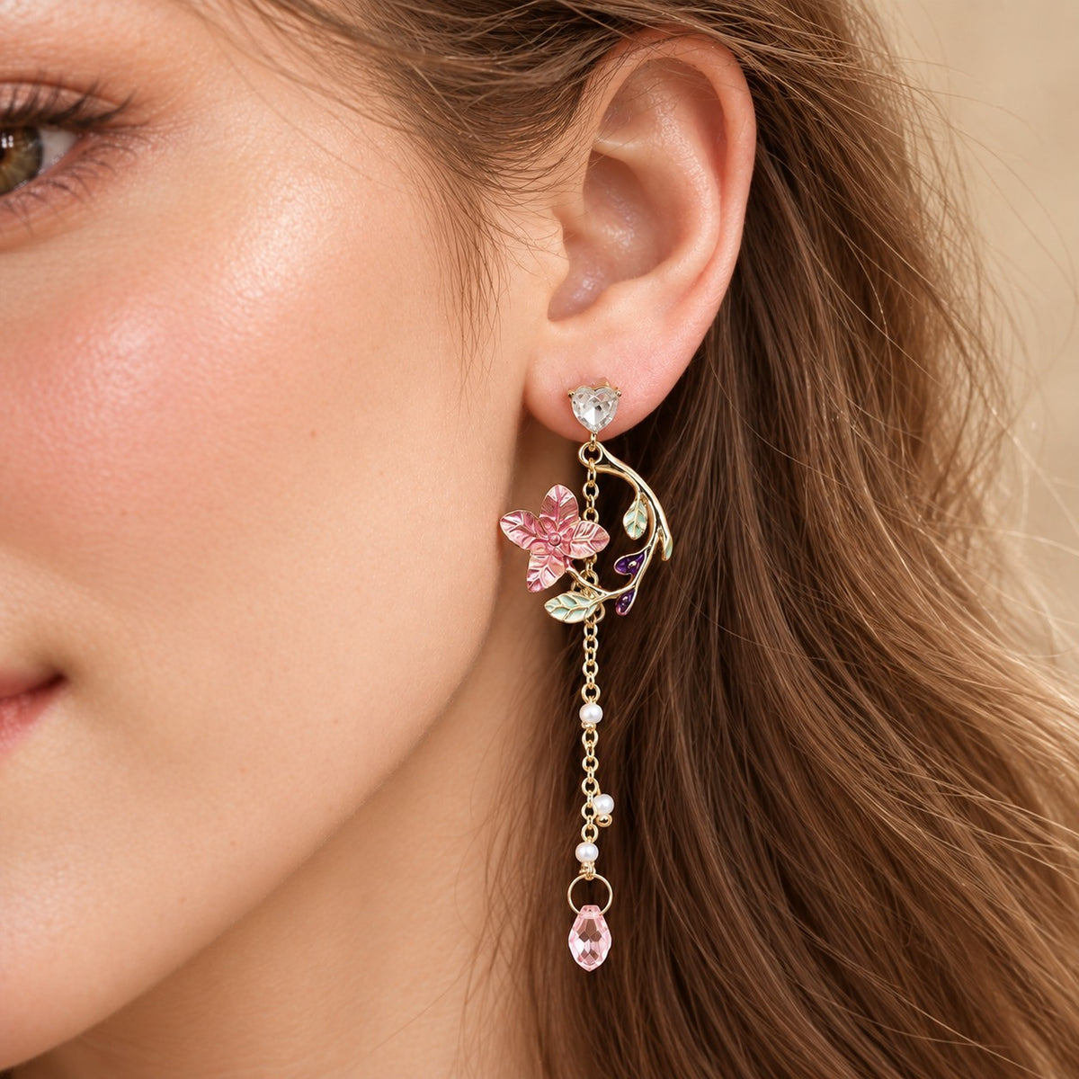 Close up of heart cut crystal stud and pink flower drop earring with 925 silver post