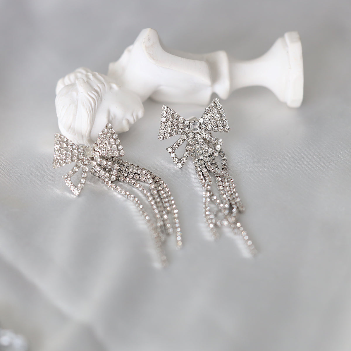 Silver Bowtie Dangle Earrings