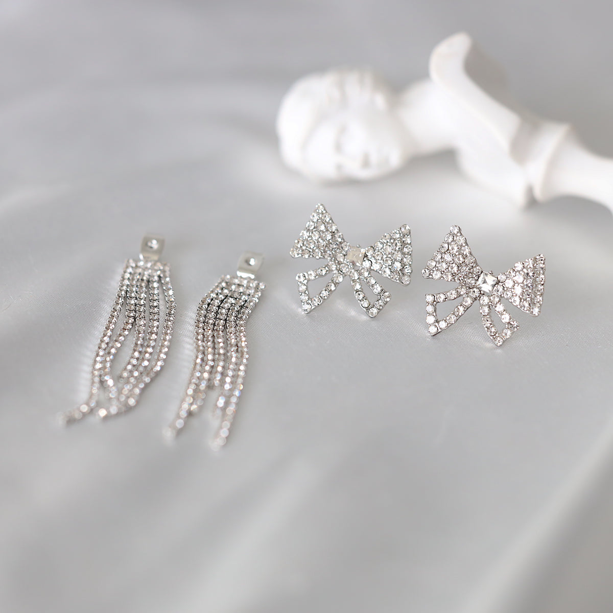 Silver Bowtie Dangle Earrings