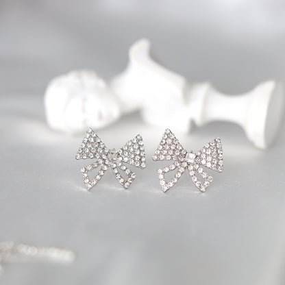 Silver Bowtie Dangle Earrings