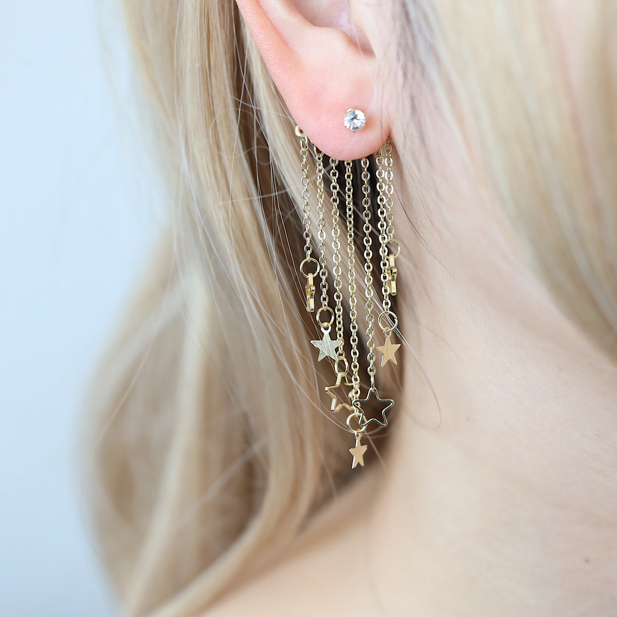 Gold Star Dangle Clubbing Earrings