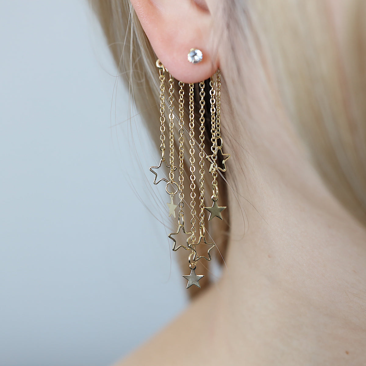 Gold Star Dangle Clubbing Earrings