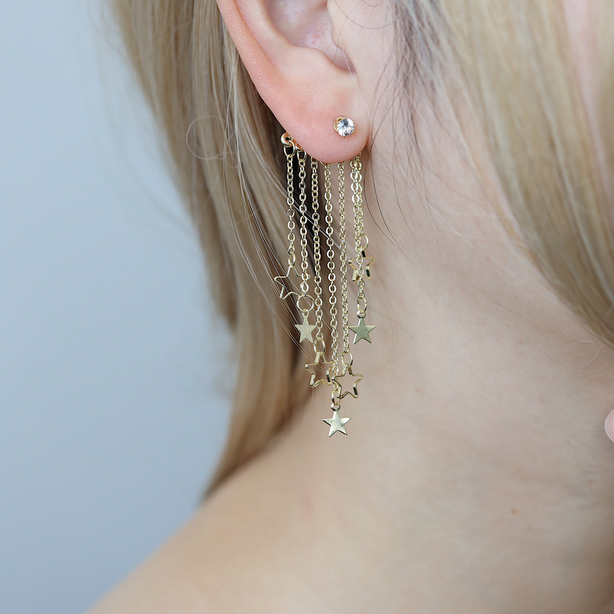 Gold Star Dangle Clubbing Earrings