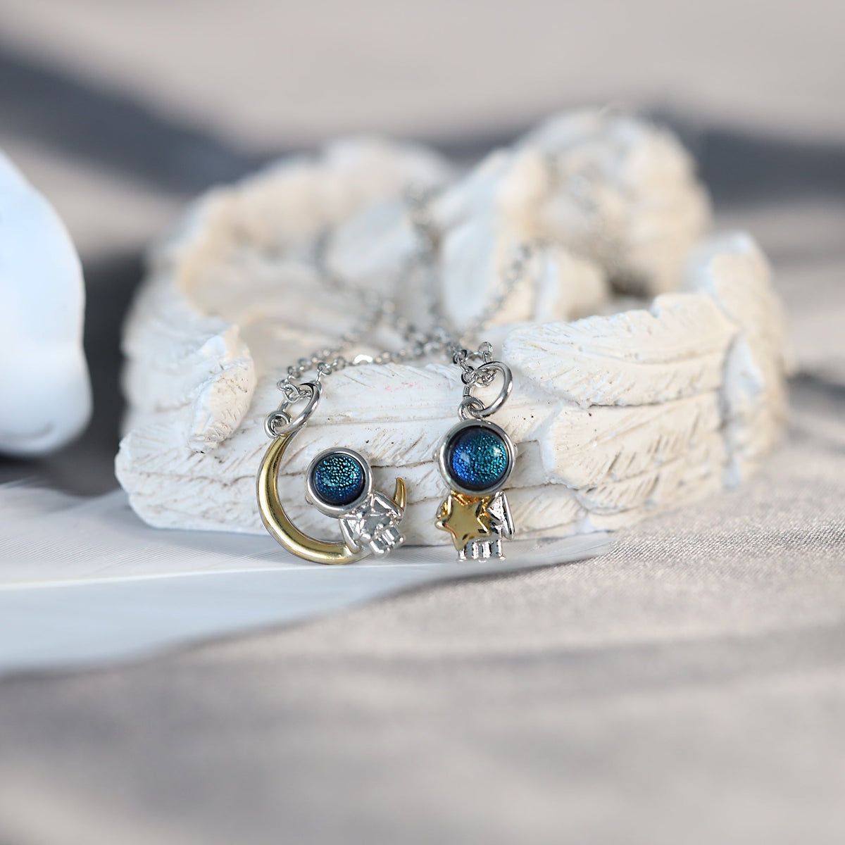 Star and Moon Spaceman Necklaces