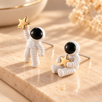 Astronaut star stud earrings with 925 sterling silver posts on stone