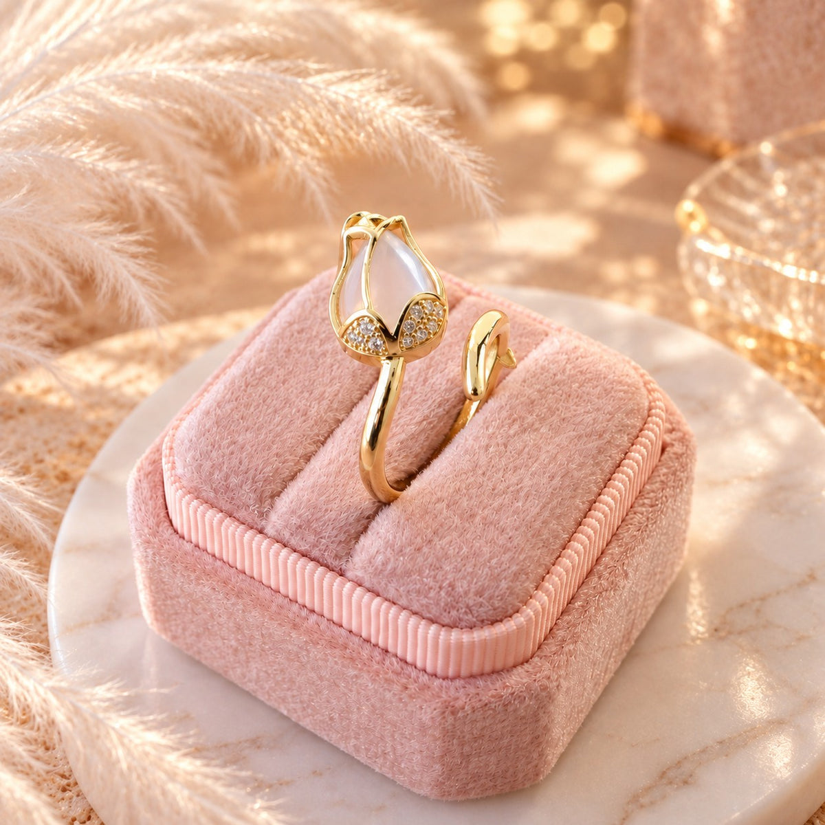 Gold tulip flower ring in pink velvet ring box